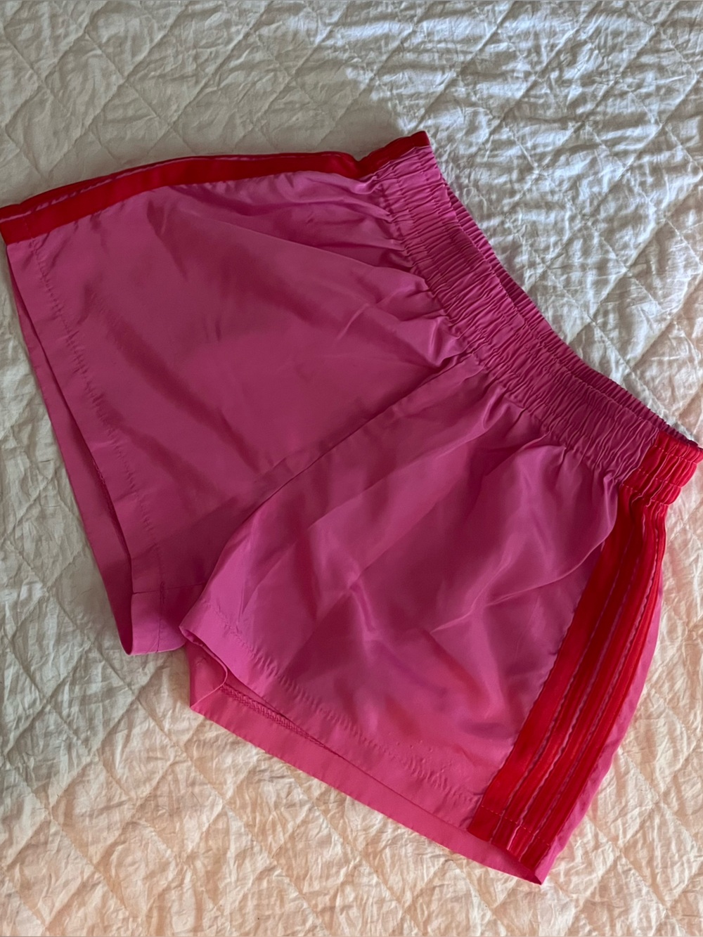 Amazon Women's Pink Athletic Shorts with Red Side Trim